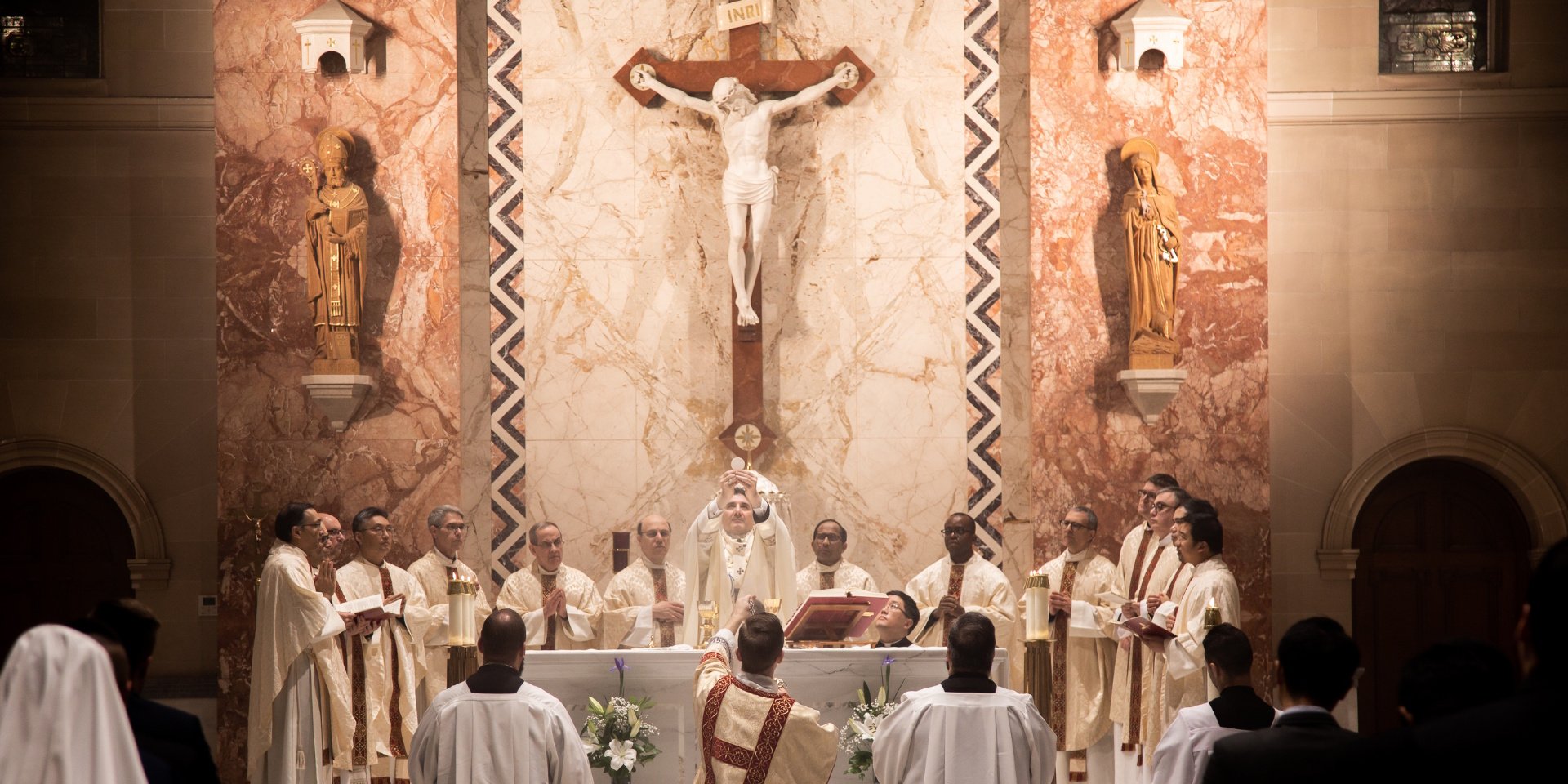 Mass being celebrated at the chapel at St. Augustine's Seminary