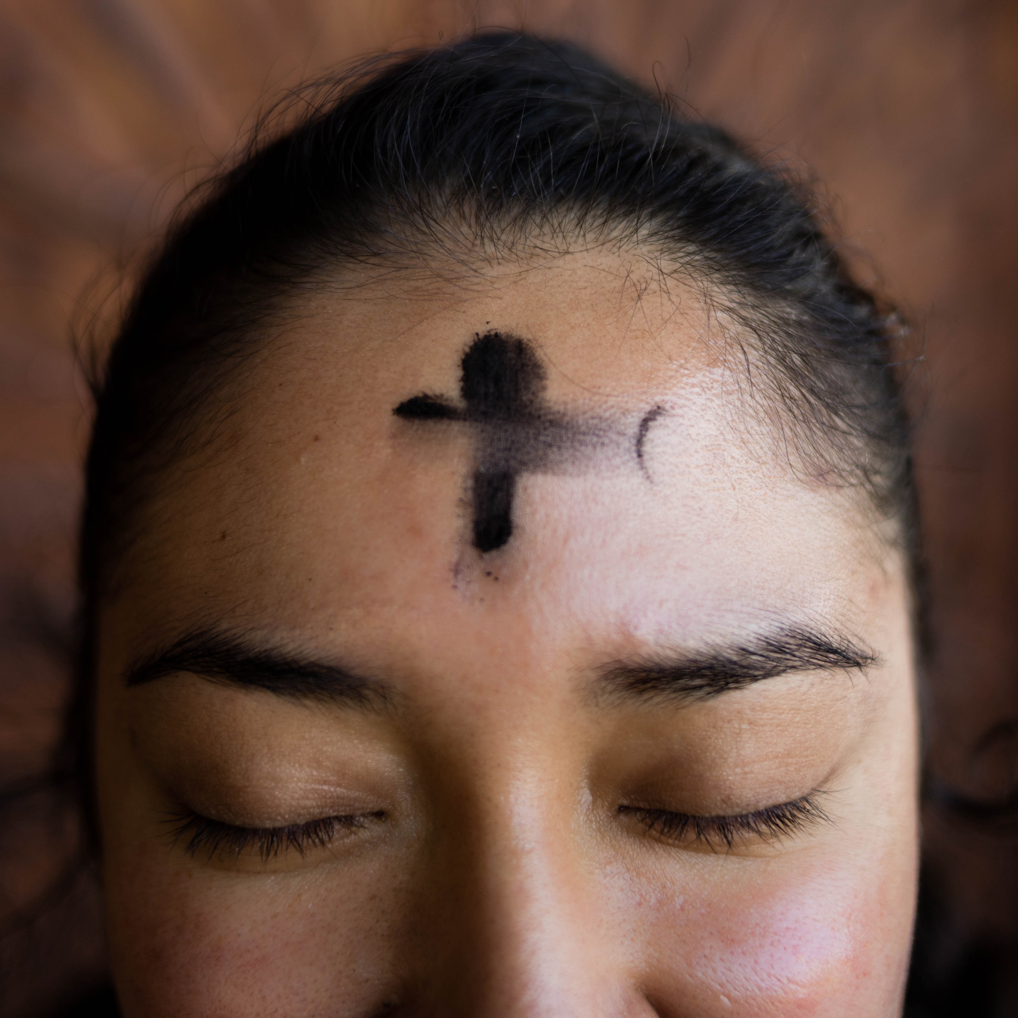 Square photo of Ashes on a forehead