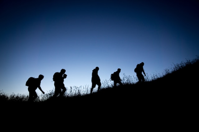 Group climbing hill