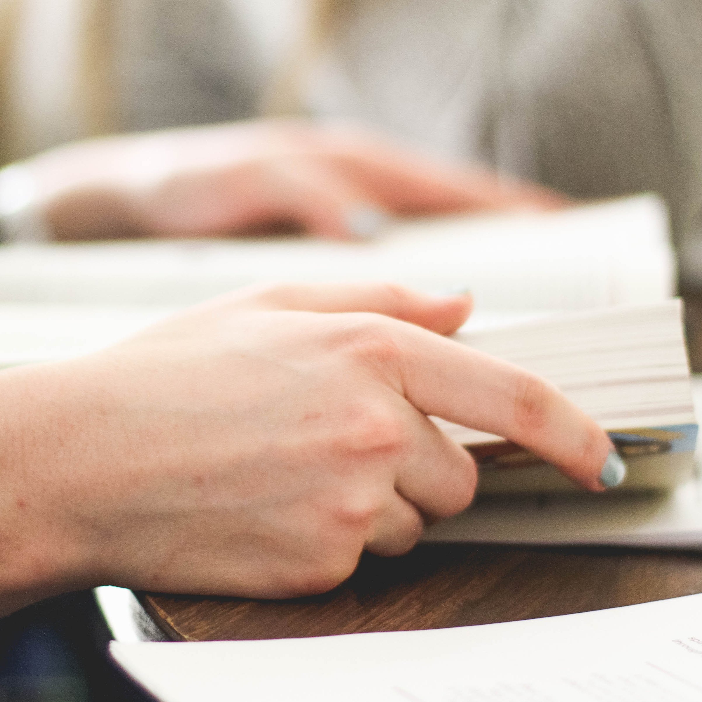 Hands Holding Book