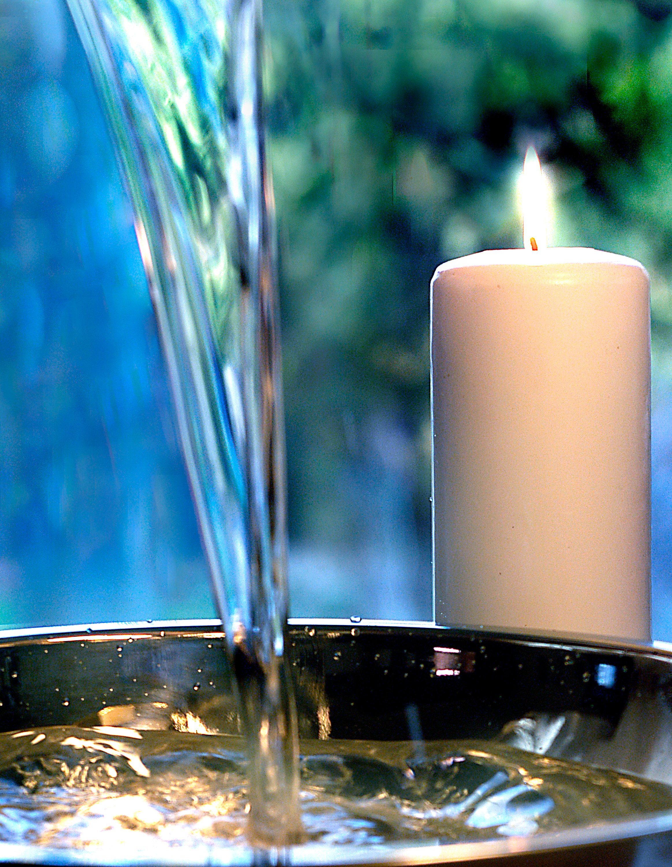 Candle with flowing water